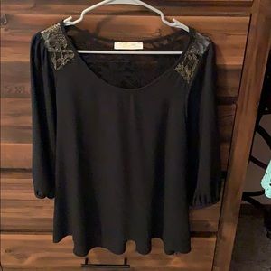 Black 3/4 sleeve top with gold lace detail